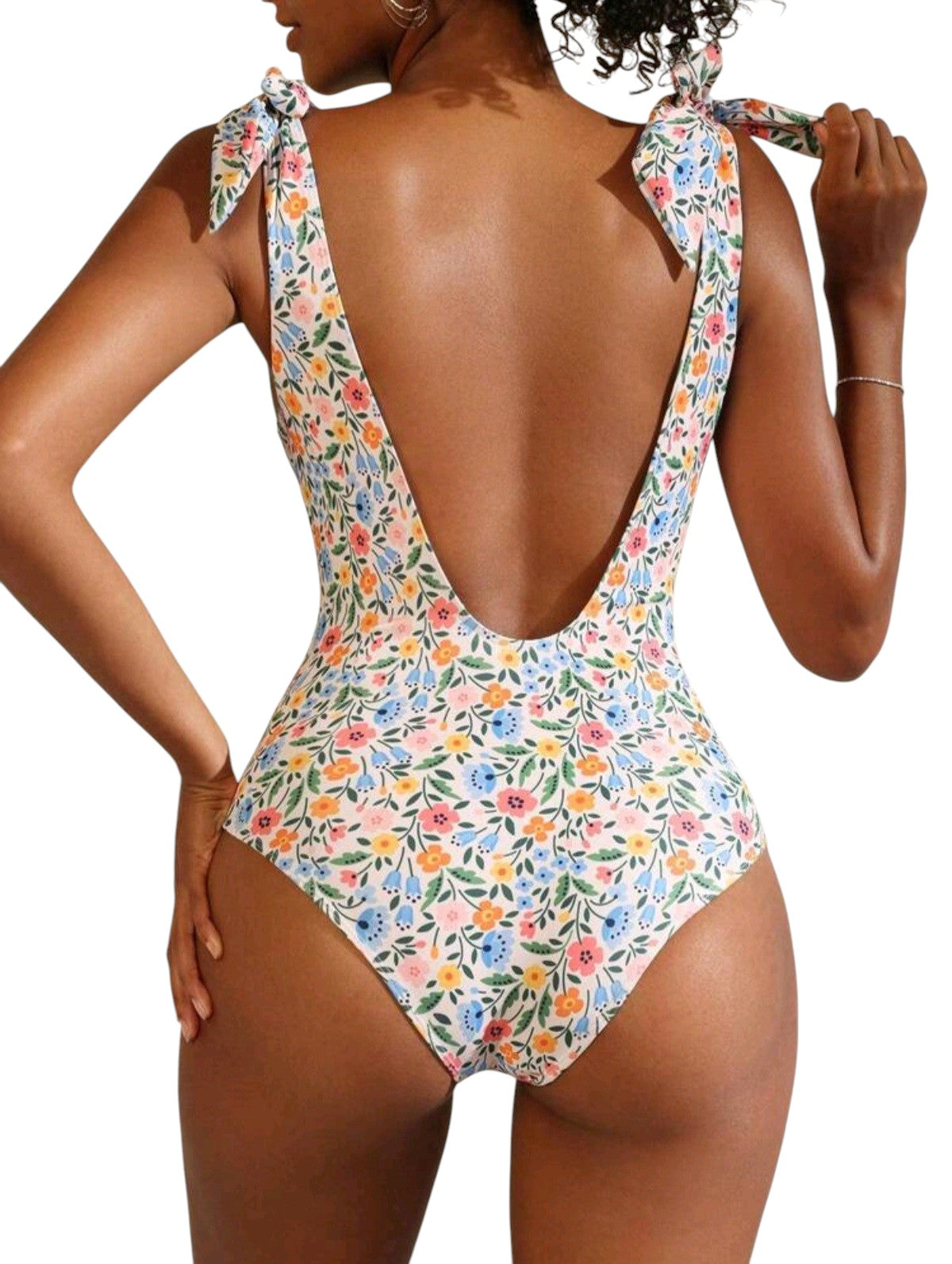 SHE fehér virágmintás megkötős pántú egyberészes fürdőruha