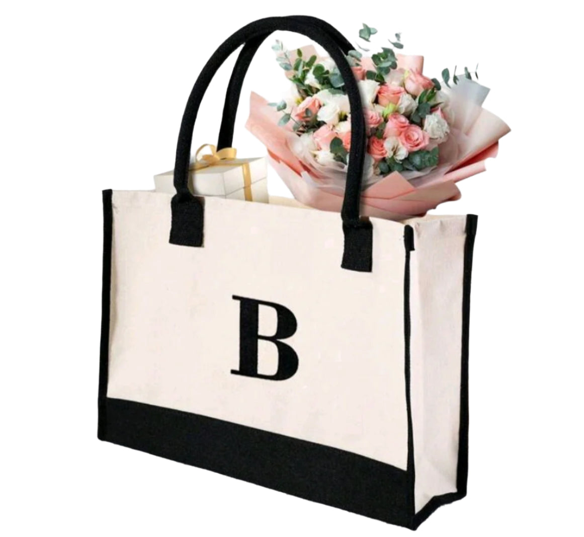 SHE fekete-fehér vászon kézitáska