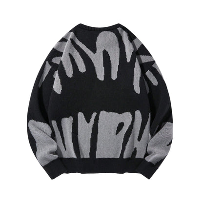 SHE fekete mintás pulóver